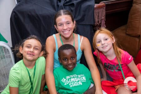 Happy children at Canyon Springs Church youth event, smiling and enjoying community.