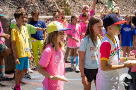 Children participating in outdoor activity at Canyon Springs Church event.