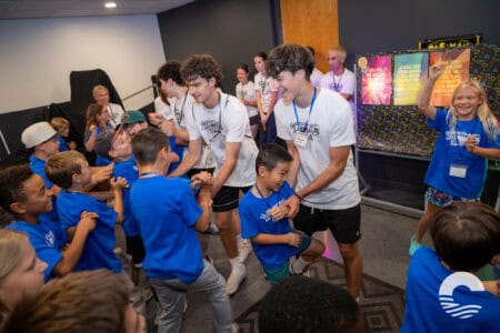 Children and teens enjoying a lively youth event at Canyon Springs Church.