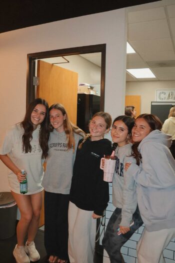 Group of smiling teenagers at Canyon Springs Church youth event.
