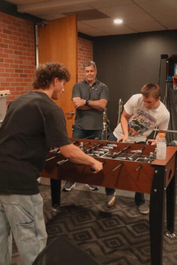Foosball game at Canyon Springs Church youth event.