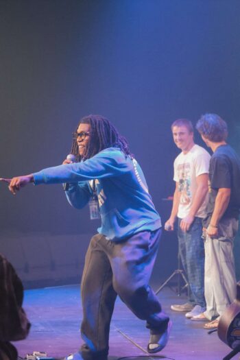 Youth group performing on stage at Canyon Springs Church event.