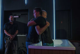 Heartfelt hug during a worship service at Canyon Springs Church, emphasizing community and faith. Two people hugging during a church service at Canyon Springs Church.