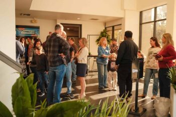 People gathering at Canyon Springs Church during a community event.