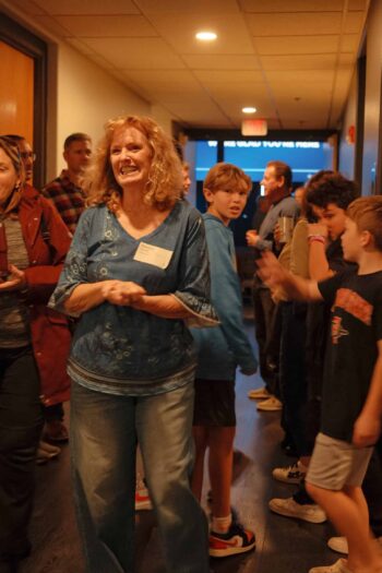 Canyon Springs Church community gathering with diverse attendees smiling and engaging.