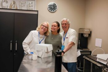 Happy volunteers at Canyon Springs Church food drive event in the kitchen.